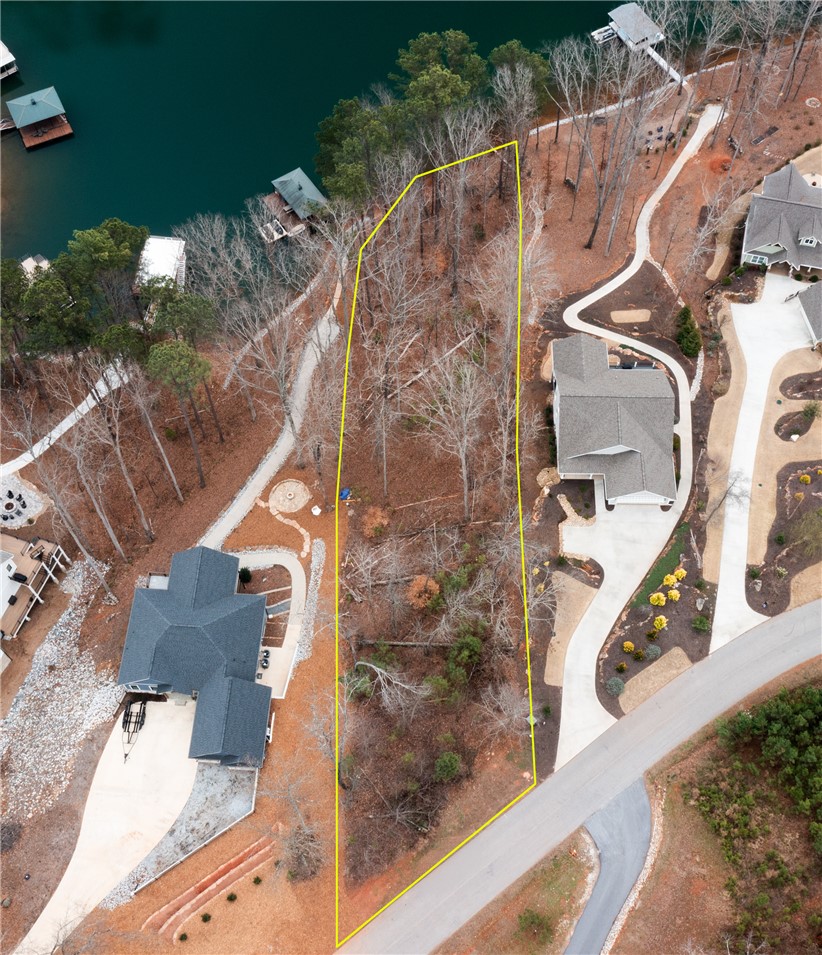 Lot 17 Retreat Pointe Road West Union, SC 29696 - Photo 8 of 22 This aerial view showcases a desirable waterfront lot with ample space for building your dream home.