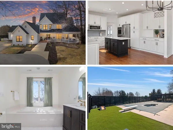 a front view of a house with yard porch and garage