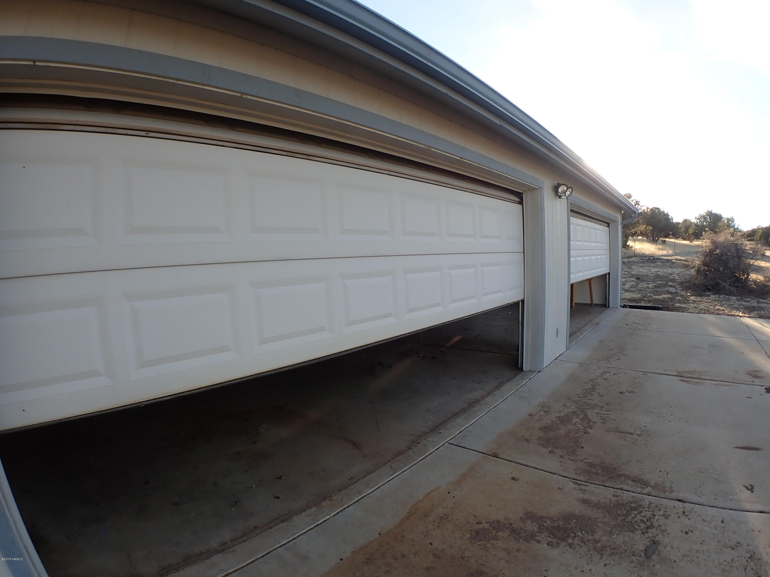 5945 Leupp Road Flagstaff, AZ 86004 - Photo 33 of 46 2 Door access to 4 car garage