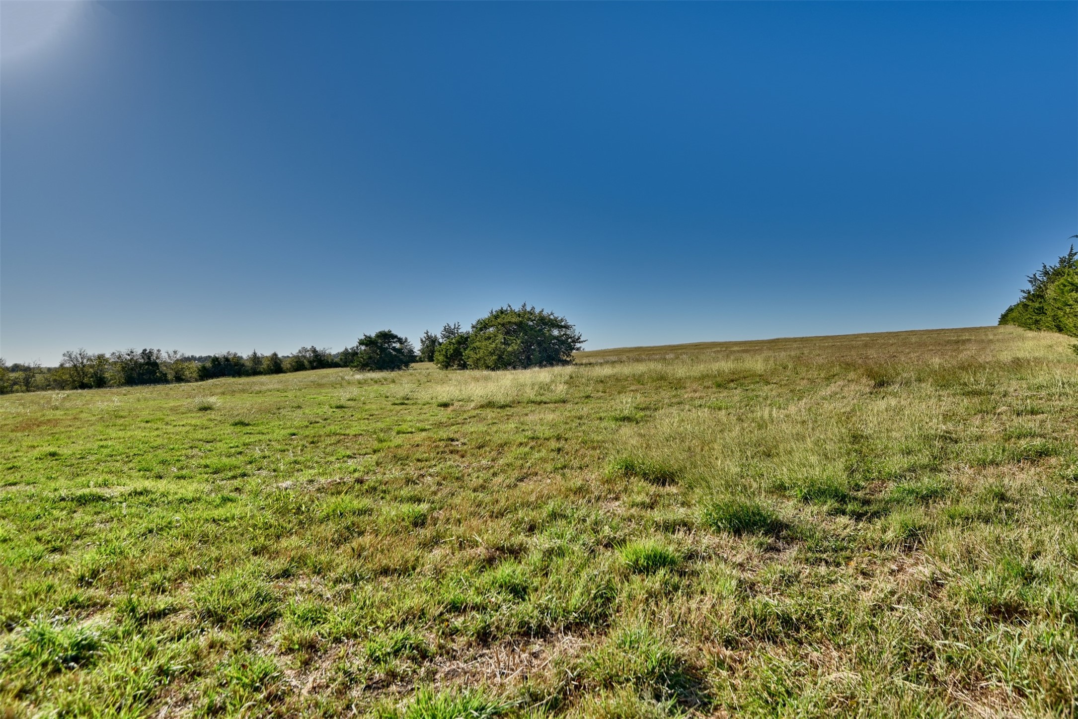 2220 Boehnemann Road Burton, TX 77835 - Photo 11 of 19 a view of a large body of water with a building in the background