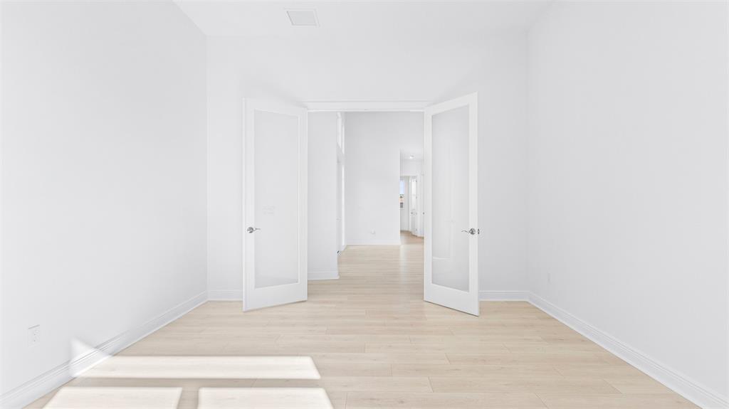 8447 Southwest Felicita Way Port St. Lucie, FL 34987 - Photo 19 of 92 a view of an empty room