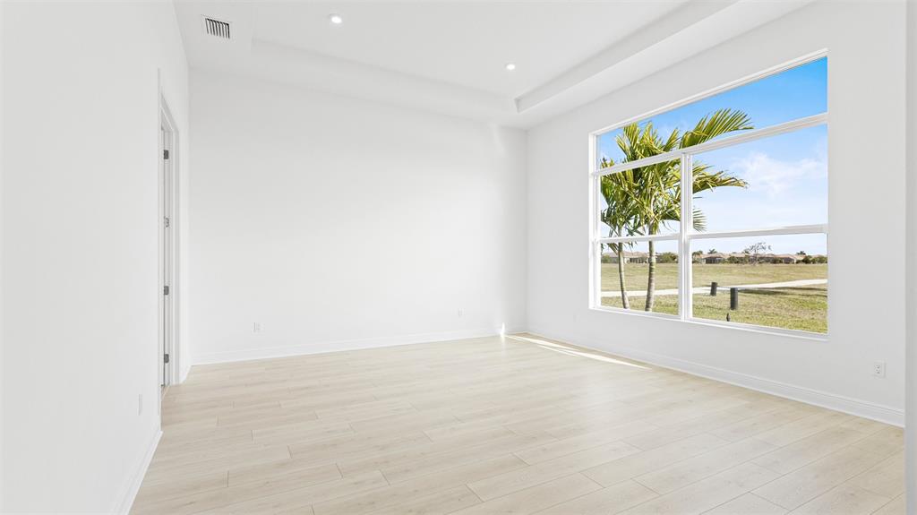 8447 Southwest Felicita Way Port St. Lucie, FL 34987 - Photo 33 of 92 an empty room with a window