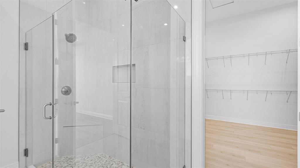 8447 Southwest Felicita Way Port St. Lucie, FL 34987 - Photo 39 of 92 a bathroom with a shower