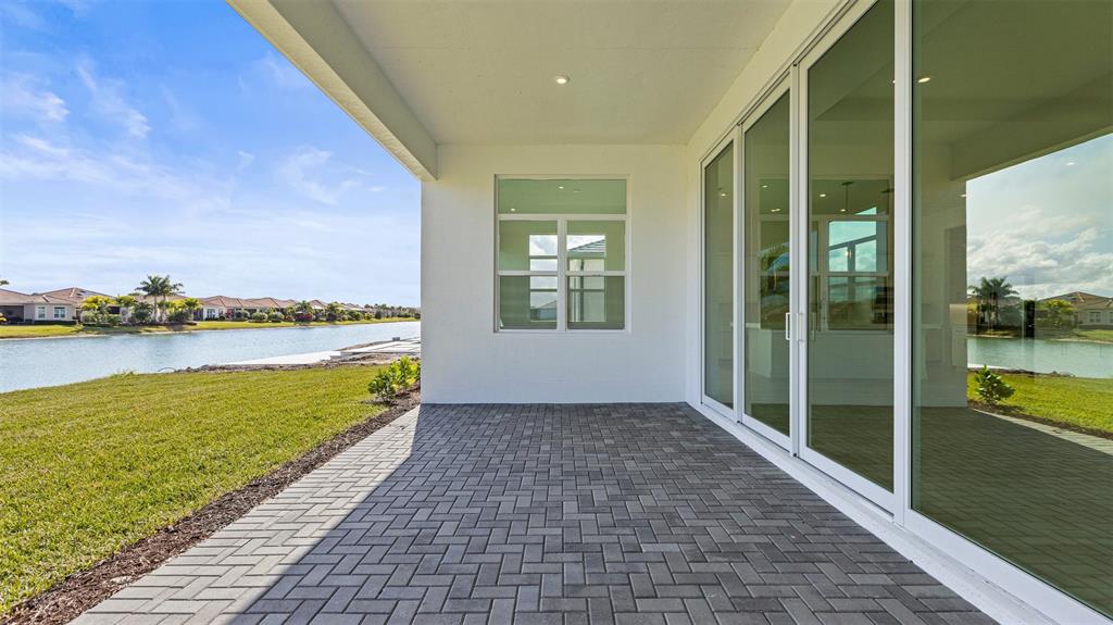 8447 Southwest Felicita Way Port St. Lucie, FL 34987 - Photo 54 of 92 a view of a balcony with an ocean view