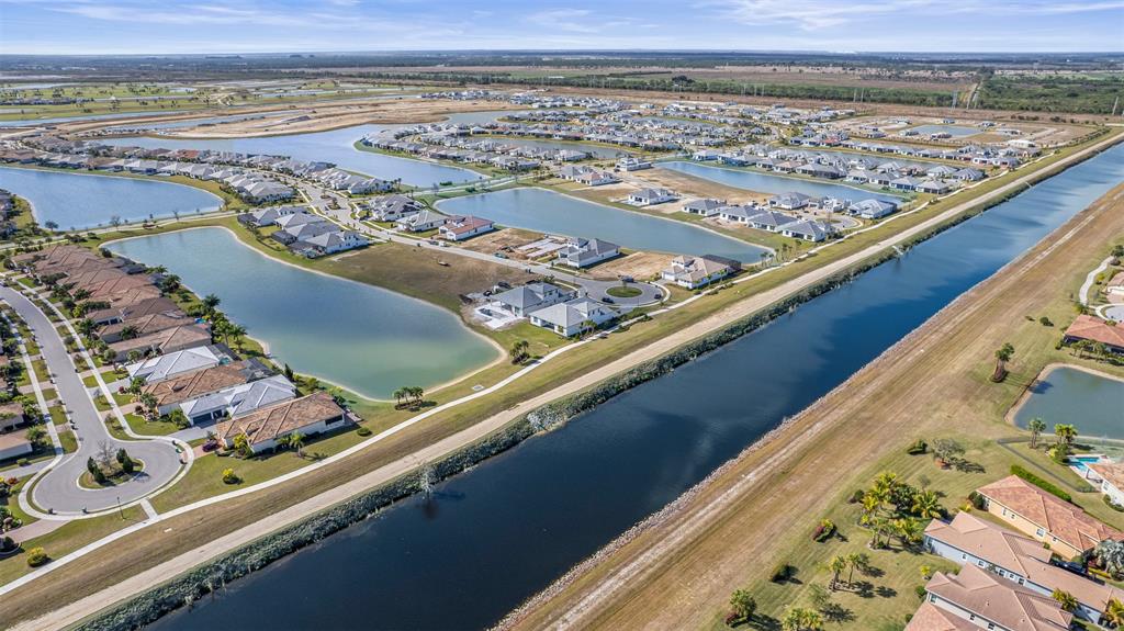 8447 Southwest Felicita Way Port St. Lucie, FL 34987 - Photo 62 of 92 an aerial view of a ocean