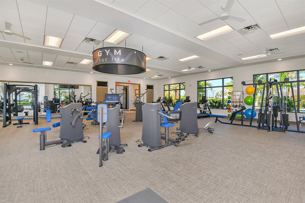 8447 Southwest Felicita Way Port St. Lucie, FL 34987 - Photo 87 of 92 a view of a room with gym equipment