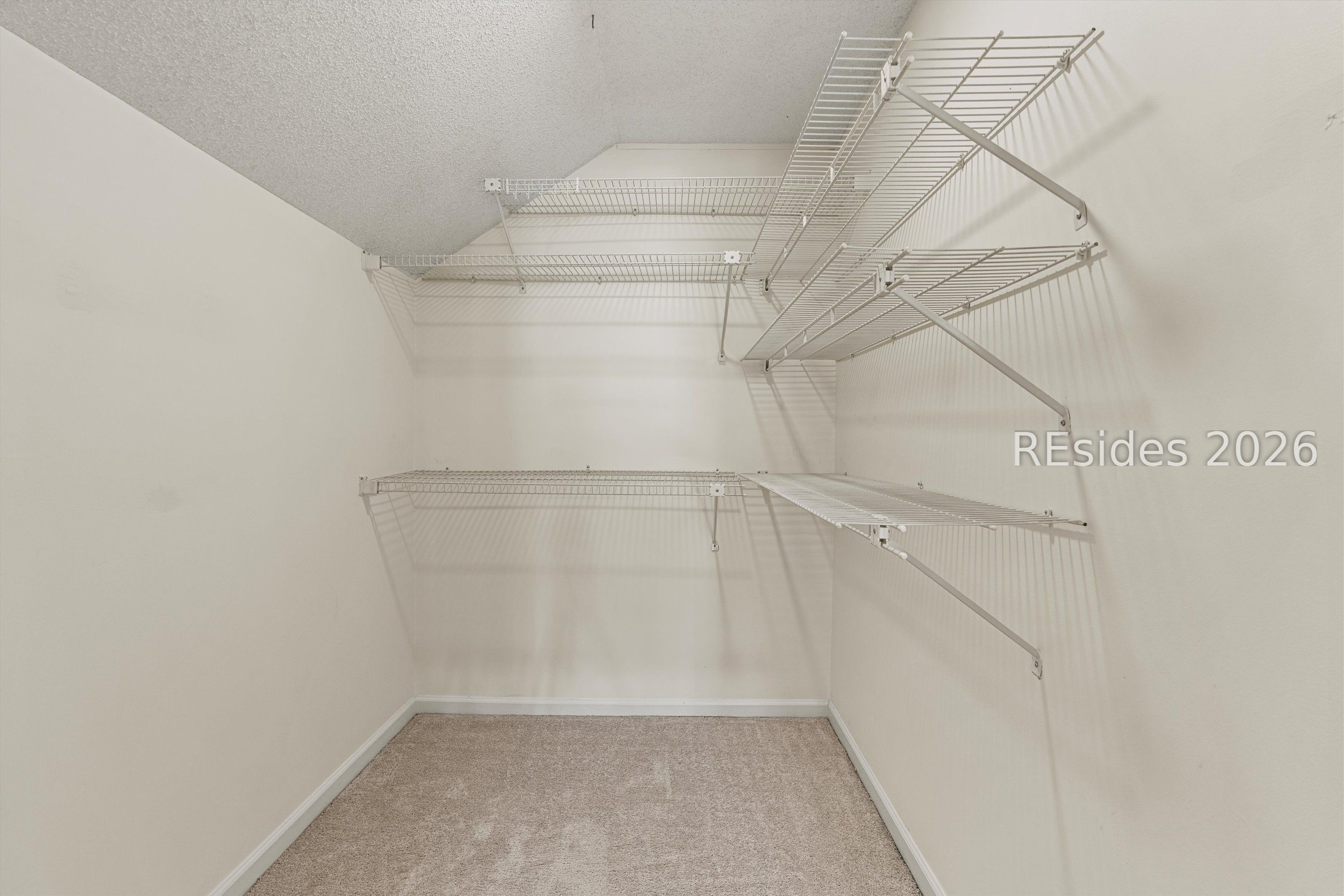 36 Wee Road, Unit 36 Hilton Head Island, SC 29926 - Photo 23 of 31 Guest Bedroom Walk-in Closet