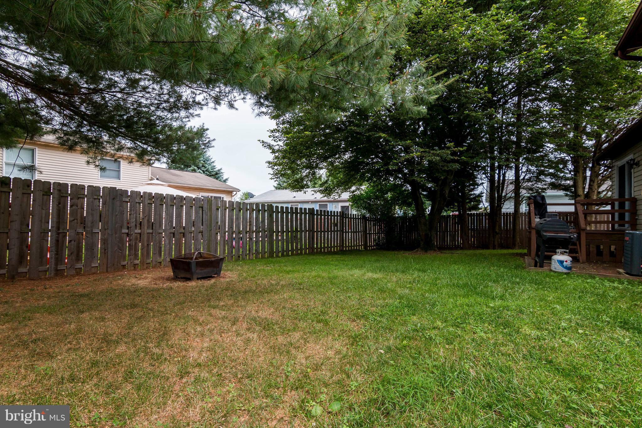 7 Centerside Road Mount Airy, MD 21771 - Photo 14 of 15 with fire pit and fenced yard