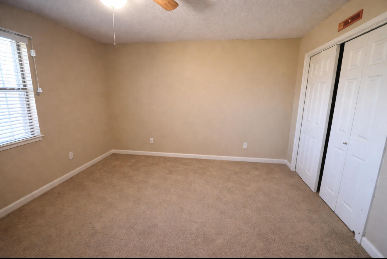 1304 1st Street Lubbock, TX 79401 - Photo 5 of 7 an empty room with a window
