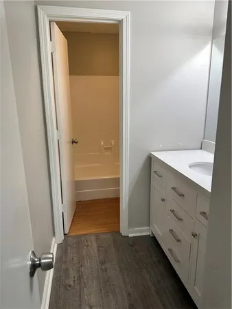a bathroom with a shower and a bathtub