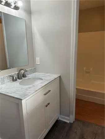 a bathroom with a shower and a toilet