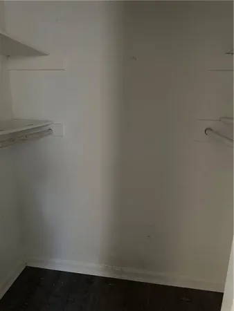 a view of small space with racks on the wall