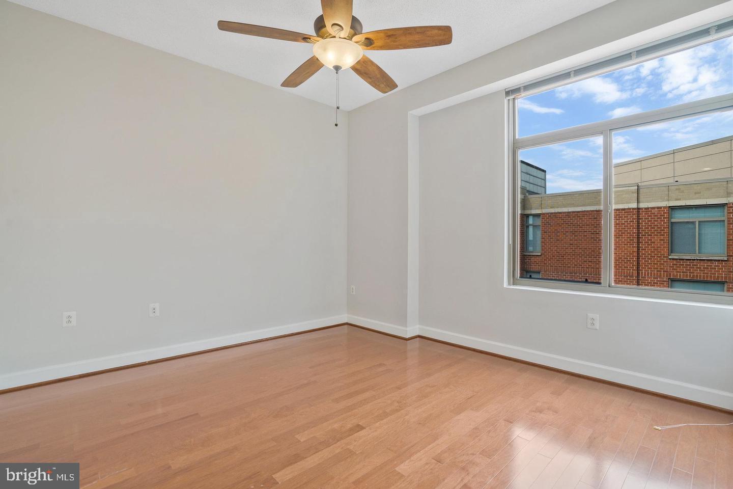 3650 South Glebe Road, Unit 638 Arlington, VA 22202 - Photo 14 of 35 an empty room with a window and a fan