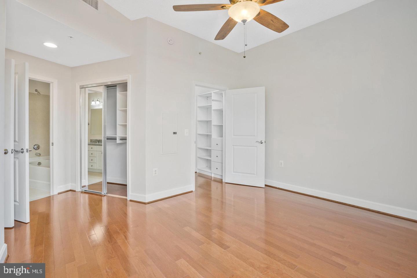 3650 South Glebe Road, Unit 638 Arlington, VA 22202 - Photo 15 of 35 wooden floor in an empty room with a window