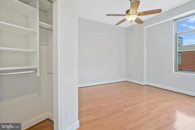 a view of an empty room with a window