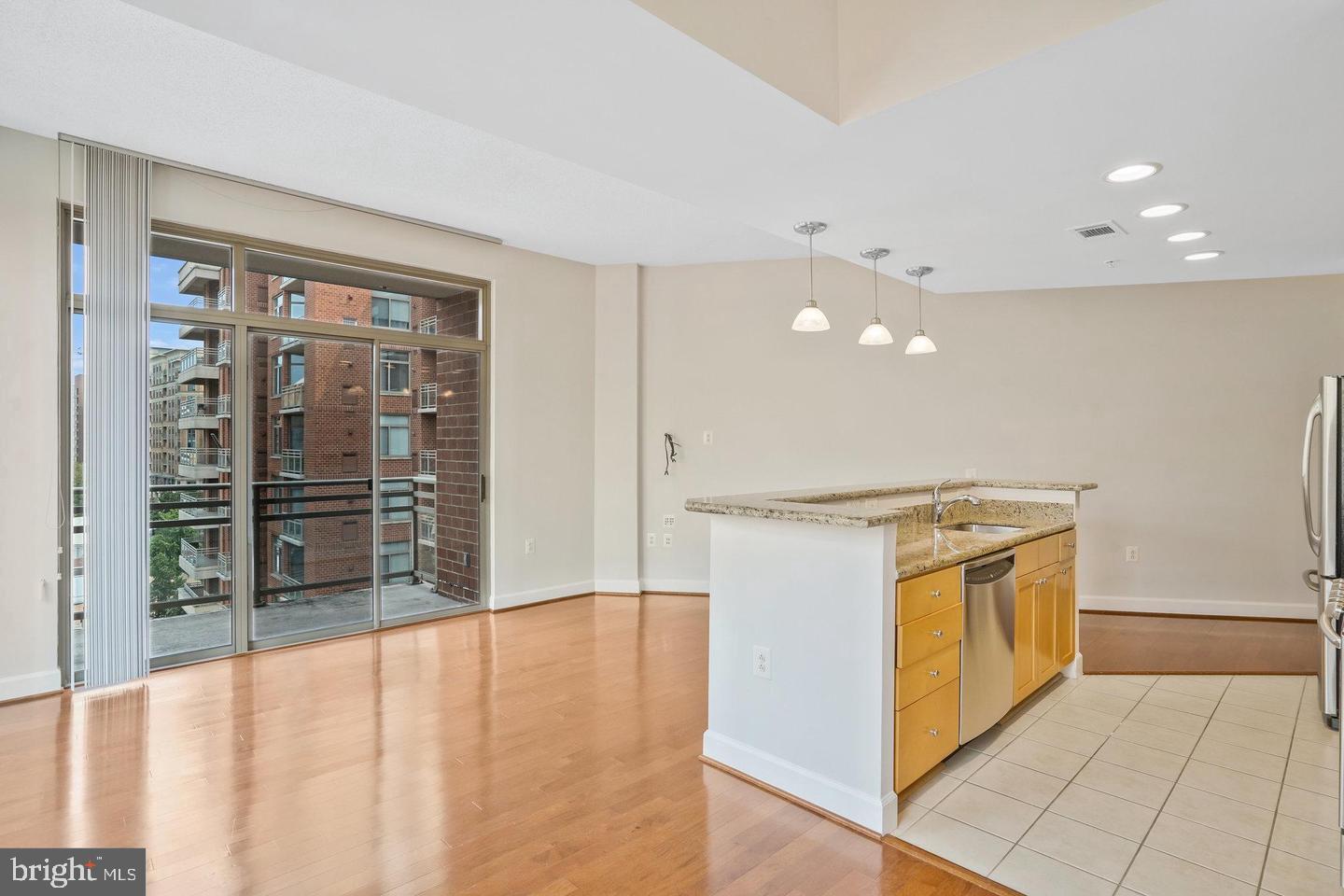 3650 South Glebe Road, Unit 638 Arlington, VA 22202 - Photo 3 of 35 a view of a kitchen with a sink and a large window