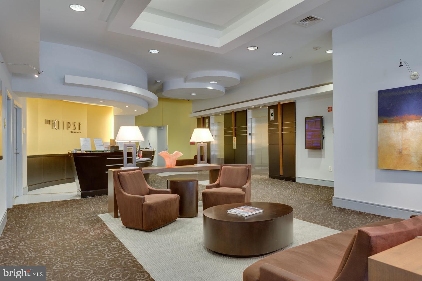 3650 South Glebe Road, Unit 638 Arlington, VA 22202 - Photo 31 of 35 a living room with furniture and a large window