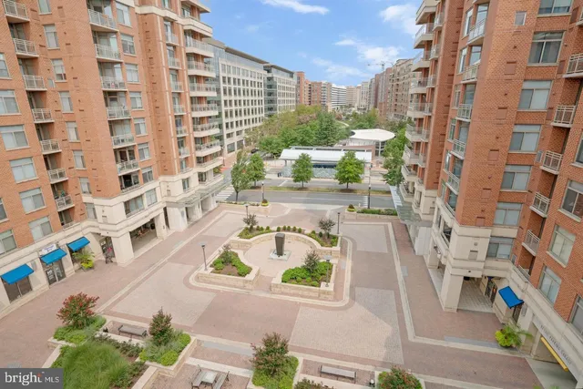 front view of a building with a tub and a rug