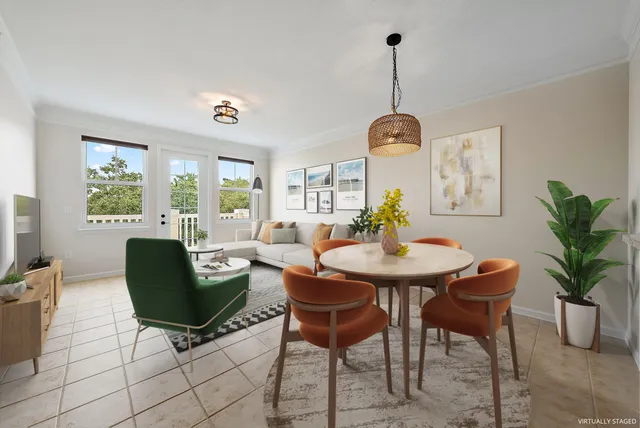 a view of a livingroom with furniture and window