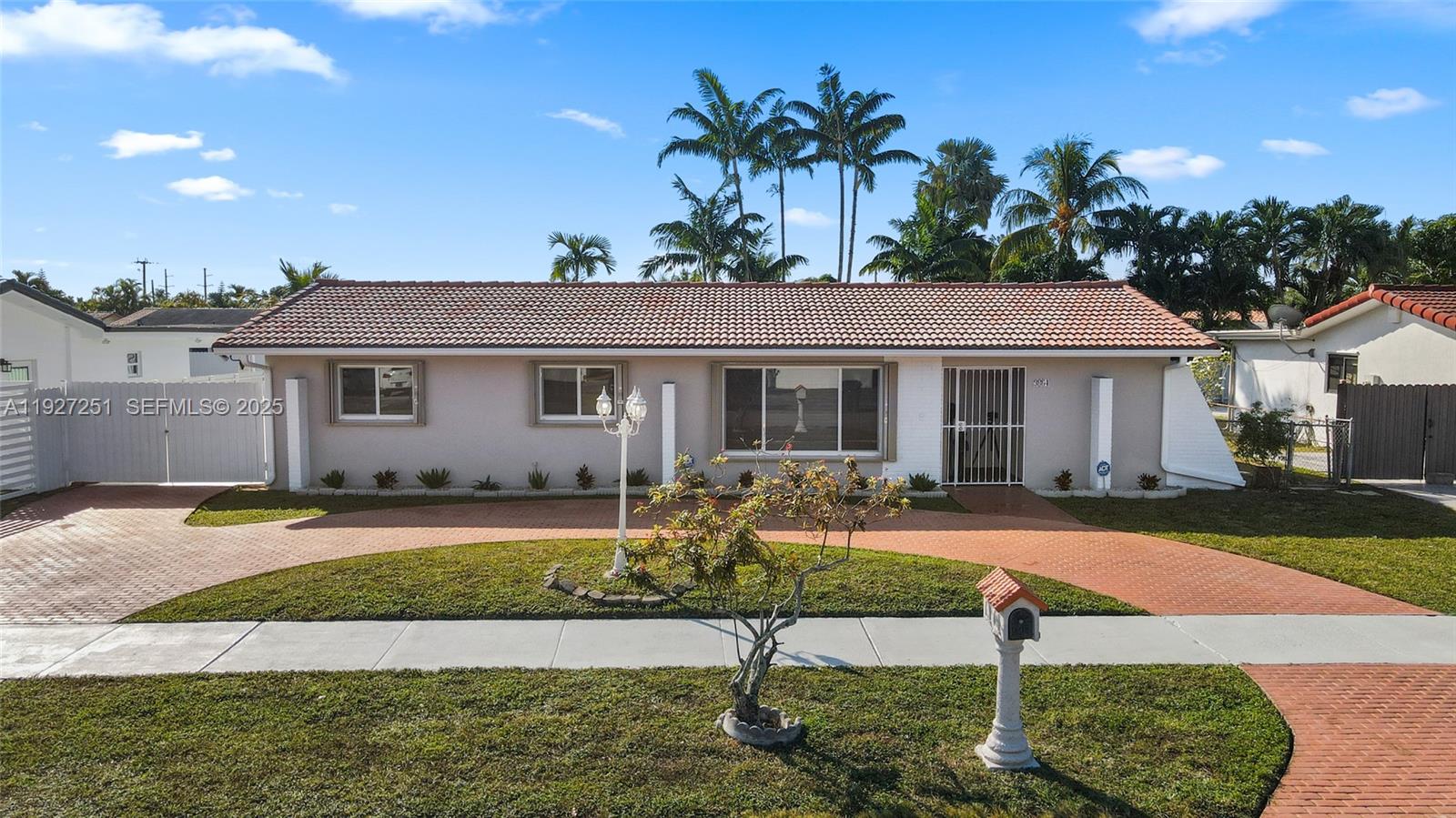 9864 Southwest 26th Terrace Miami, FL 33165 - Photo 35 of 40 front view of a house with a yard