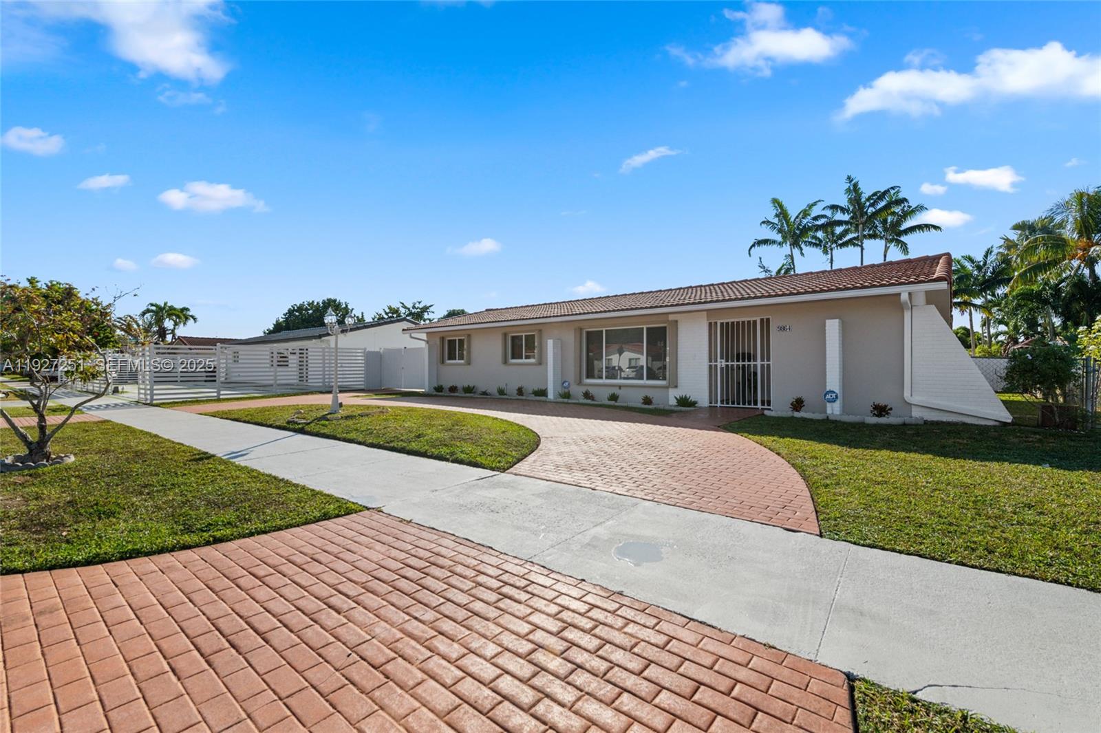 9864 Southwest 26th Terrace Miami, FL 33165 - Photo 4 of 40 a view of outdoor space yard and swimming pool