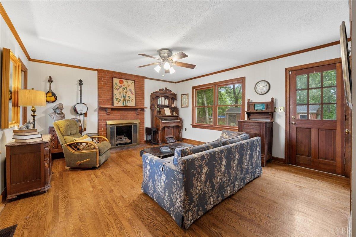 3289 Peaks Road Bedford, VA 24523 - Photo 10 of 71 a bed room with furniture and a fireplace