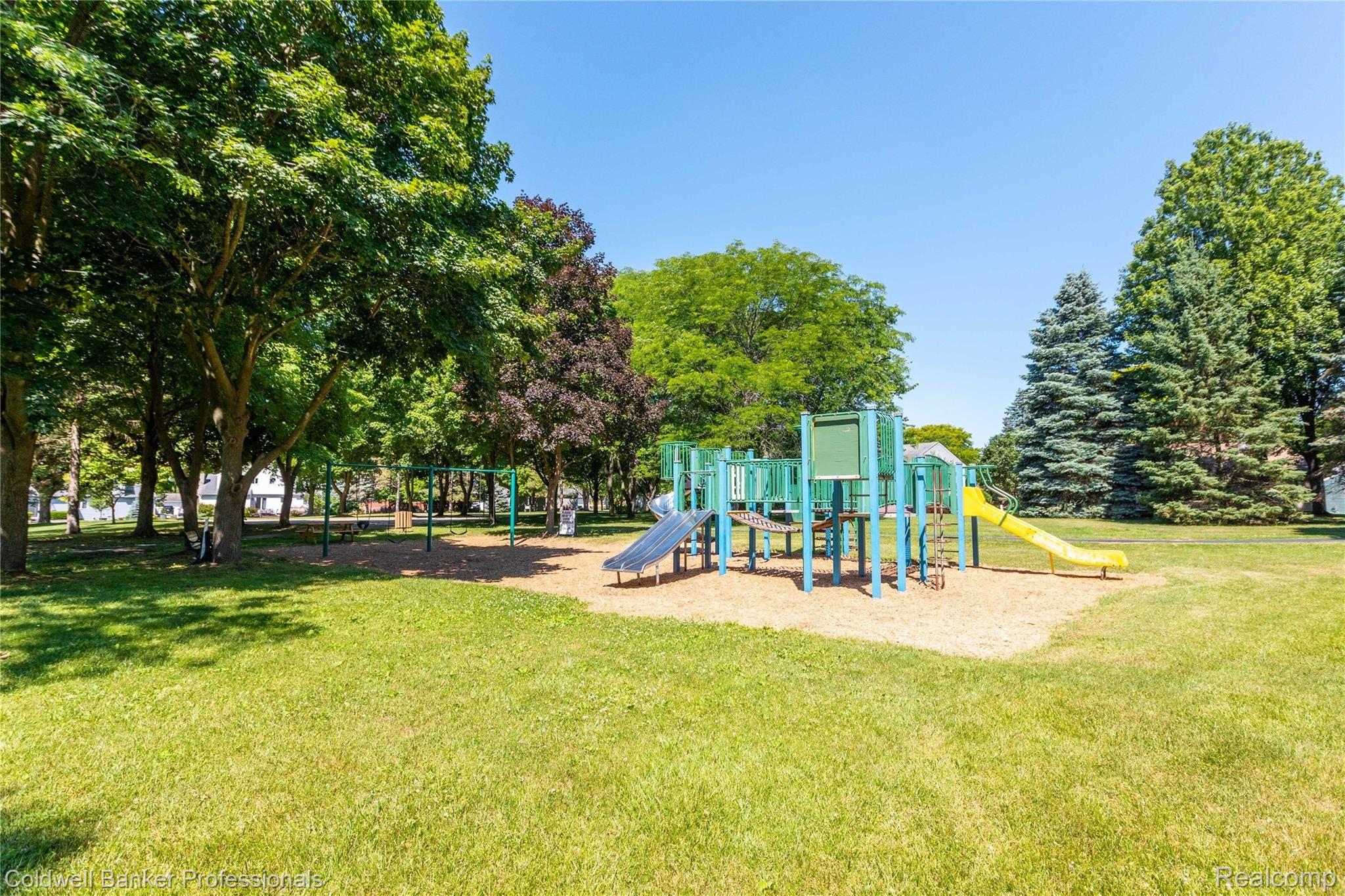 1969 Roxbury Run Wixom, MI 48393 - Photo 8 of 29 Highgate on the Green playground and common area