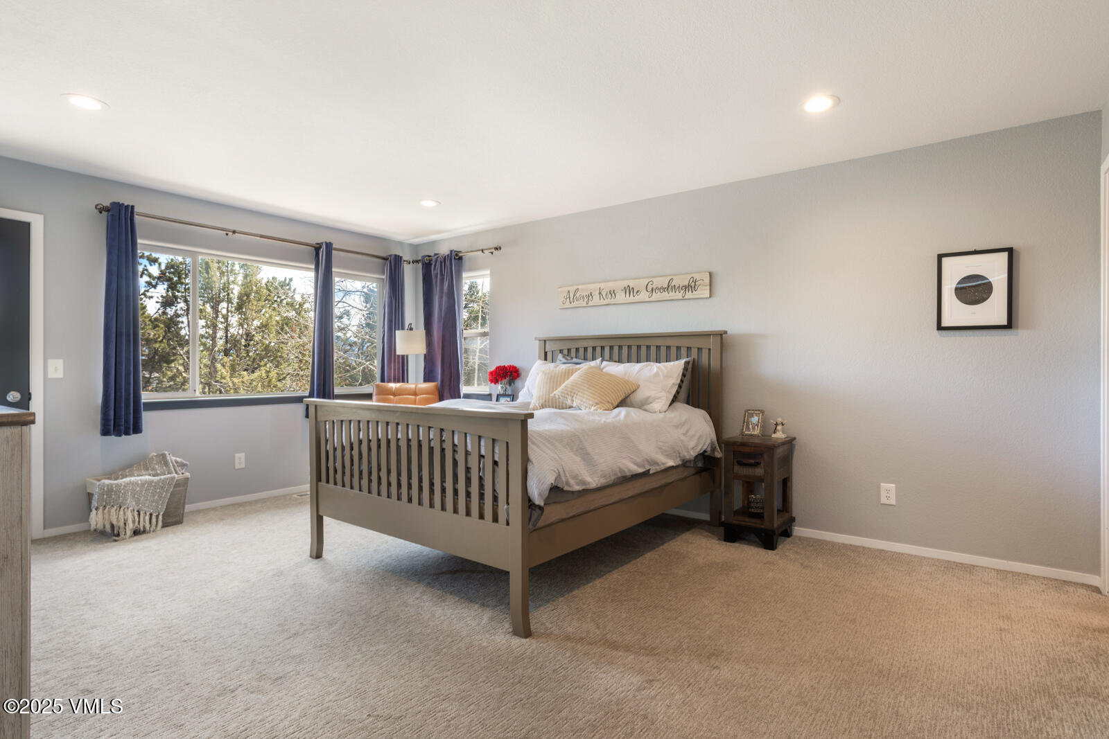 318 Mesa Drive Eagle, CO 81631 - Photo 11 of 44 a bedroom with a bed and window