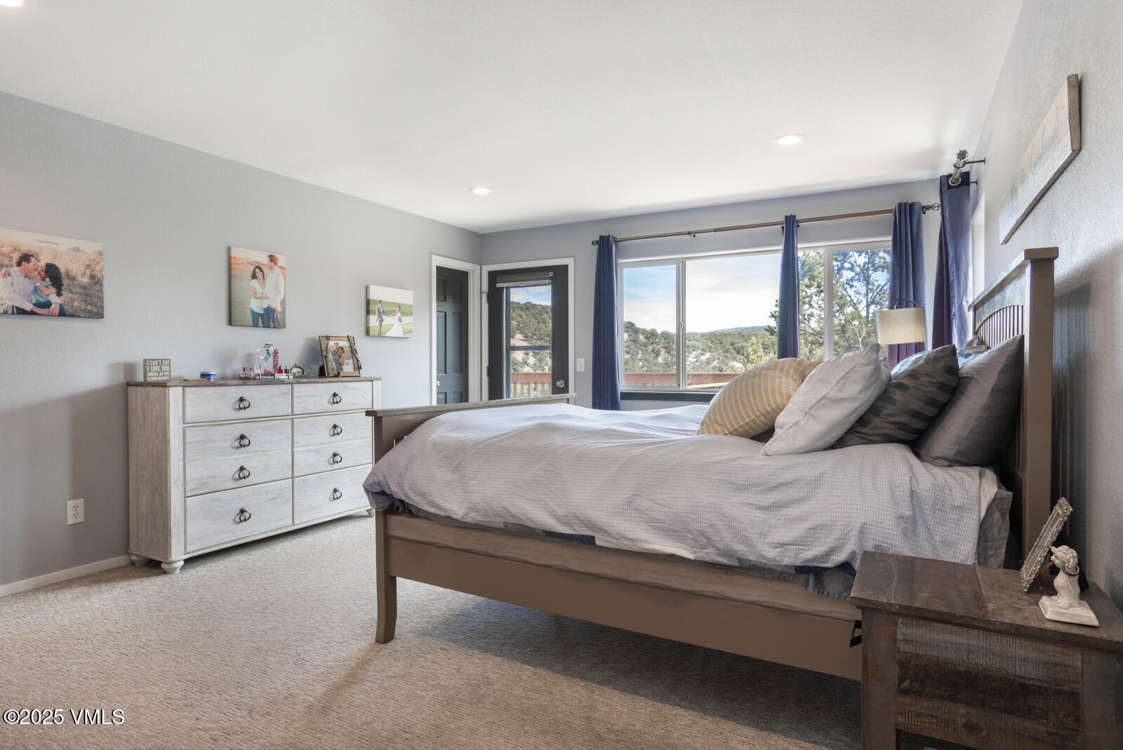 318 Mesa Drive Eagle, CO 81631 - Photo 12 of 44 a spacious bedroom with a bed and window