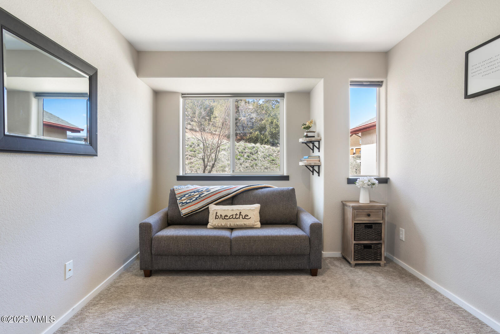 318 Mesa Drive Eagle, CO 81631 - Photo 16 of 44 a bedroom with furniture and a window