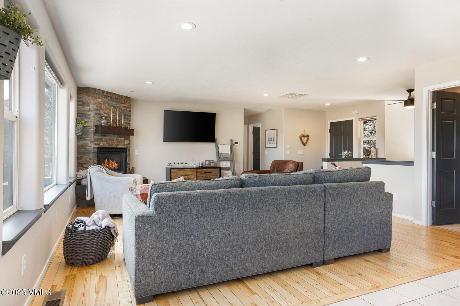 318 Mesa Drive Eagle, CO 81631 - Photo 17 of 44 a living room with furniture and a flat screen tv
