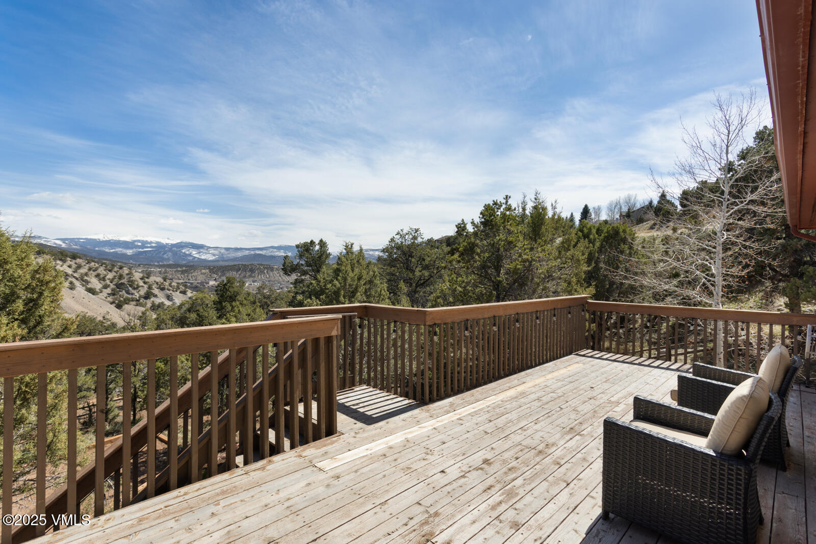 318 Mesa Drive Eagle, CO 81631 - Photo 23 of 44 a view of roof deck with furniture and trees