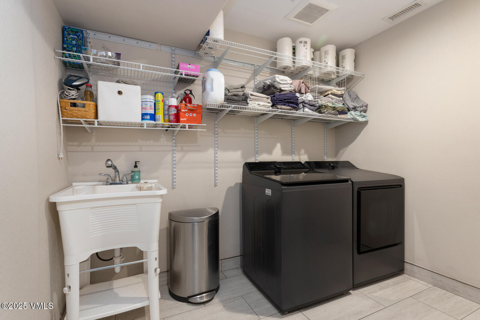 318 Mesa Drive Eagle, CO 81631 - Photo 26 of 44 a kitchen with stainless steel appliances granite countertop a sink dishwasher a stove and a refrigerator