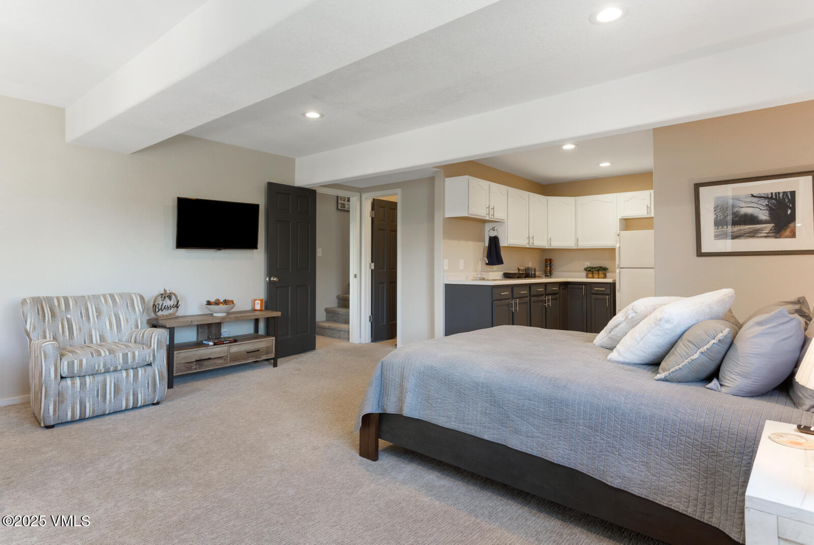 318 Mesa Drive Eagle, CO 81631 - Photo 28 of 44 a bedroom with a bed and couch