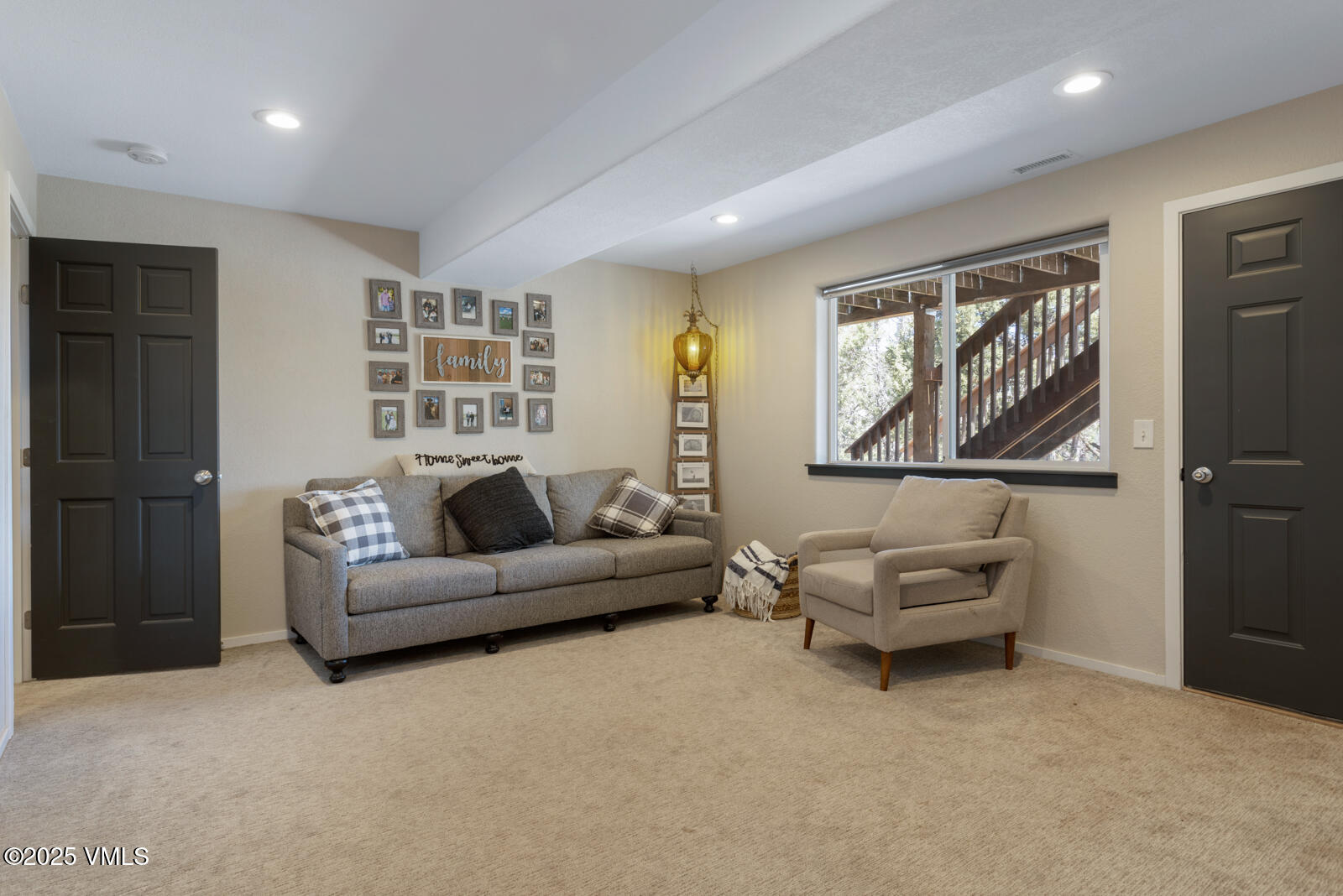 318 Mesa Drive Eagle, CO 81631 - Photo 30 of 44 a living room with furniture and a window