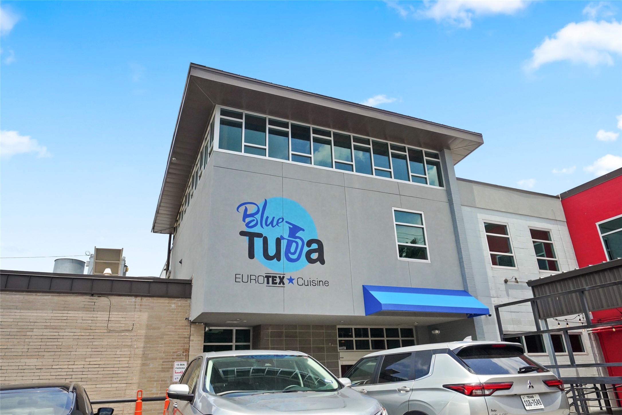 1408 Enid Street, Unit D Houston, TX 77009 - Photo 23 of 26 a front view of building with cars parked