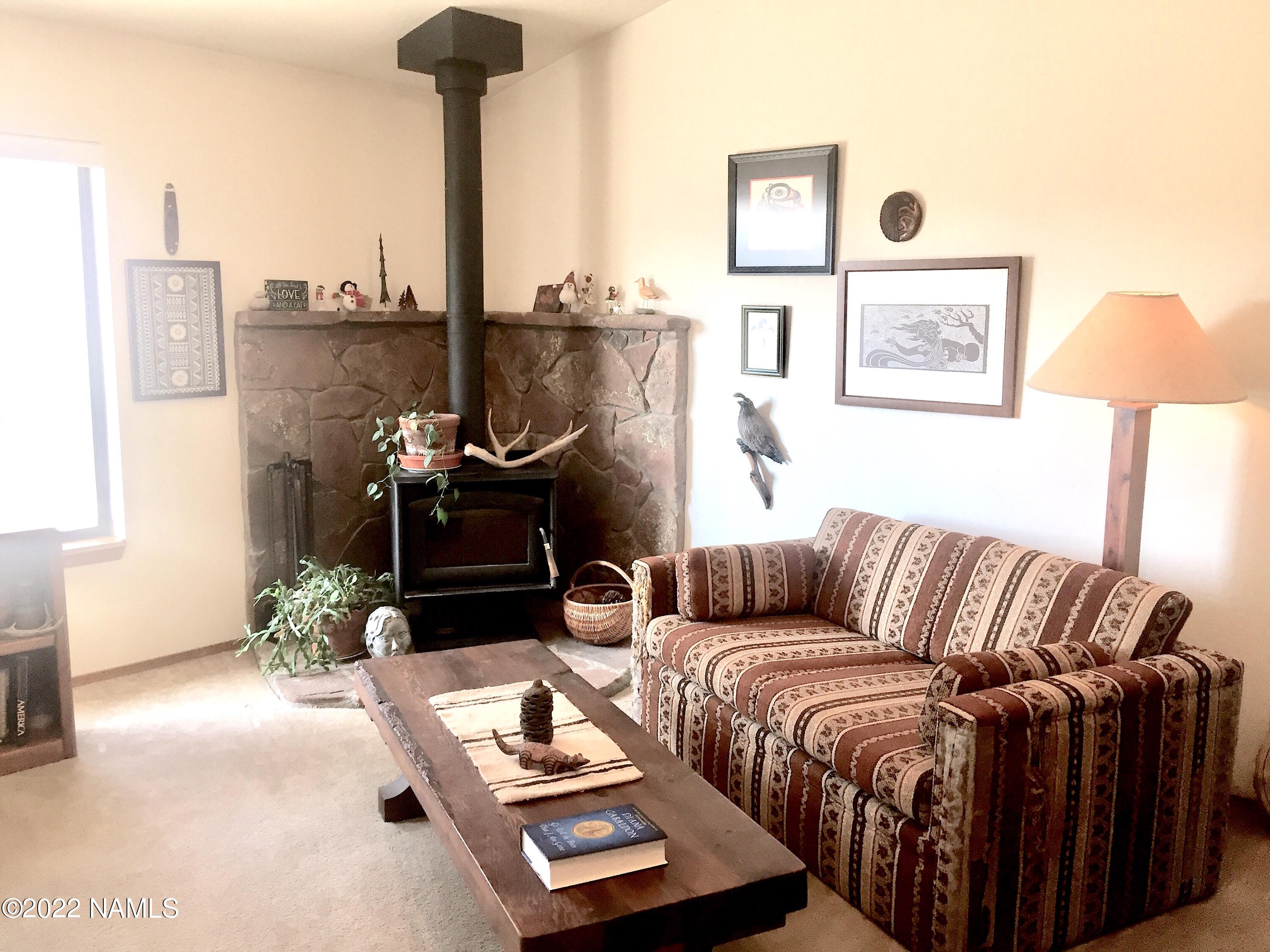 9612 Pioneer Valley Road Flagstaff, AZ 86004 - Photo 10 of 64 2A Corner Woodstove_Bright Windows