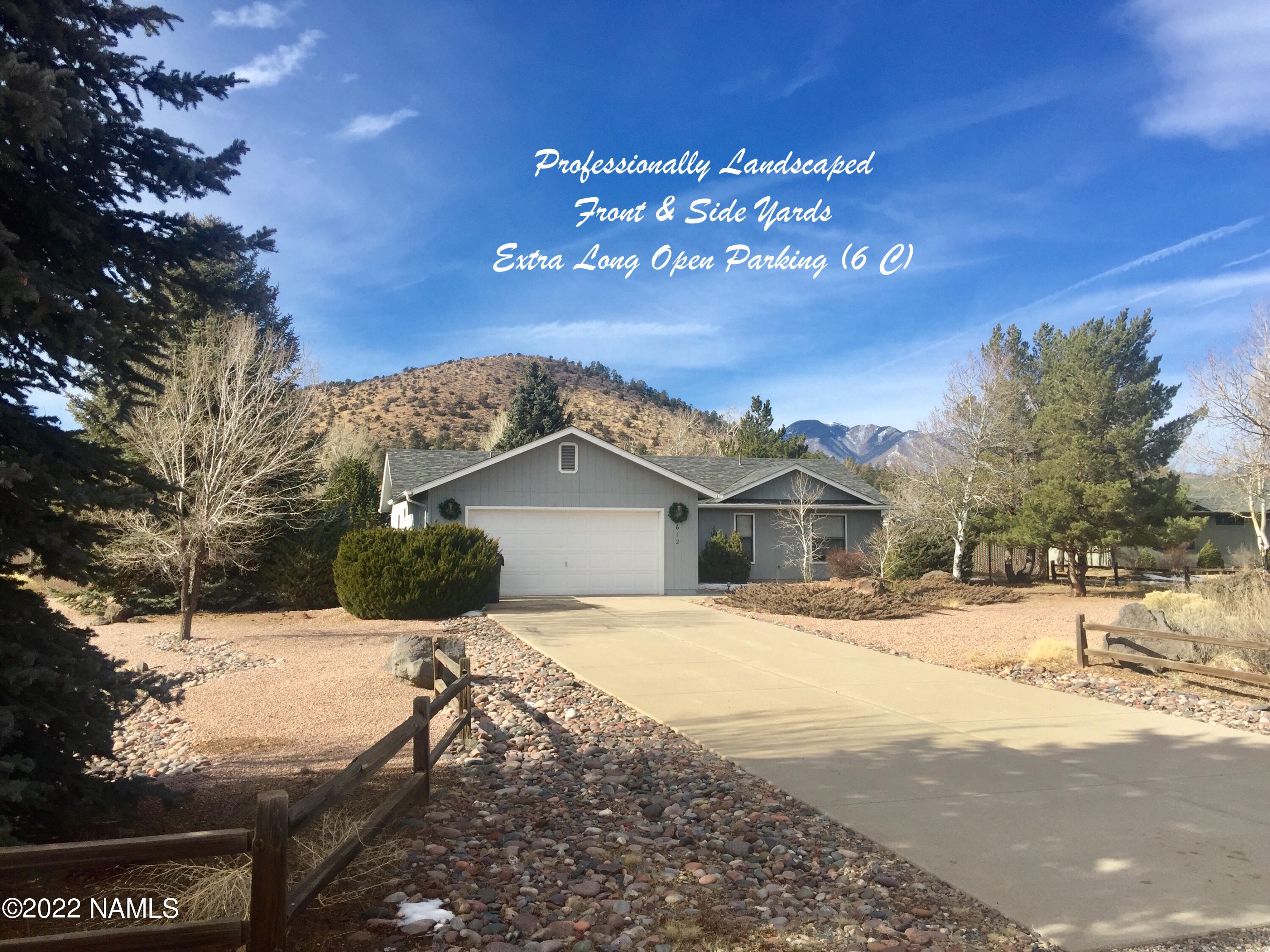 9612 Pioneer Valley Road Flagstaff, AZ 86004 - Photo 4 of 64 1B ProfLandscapedYard_6C+2
