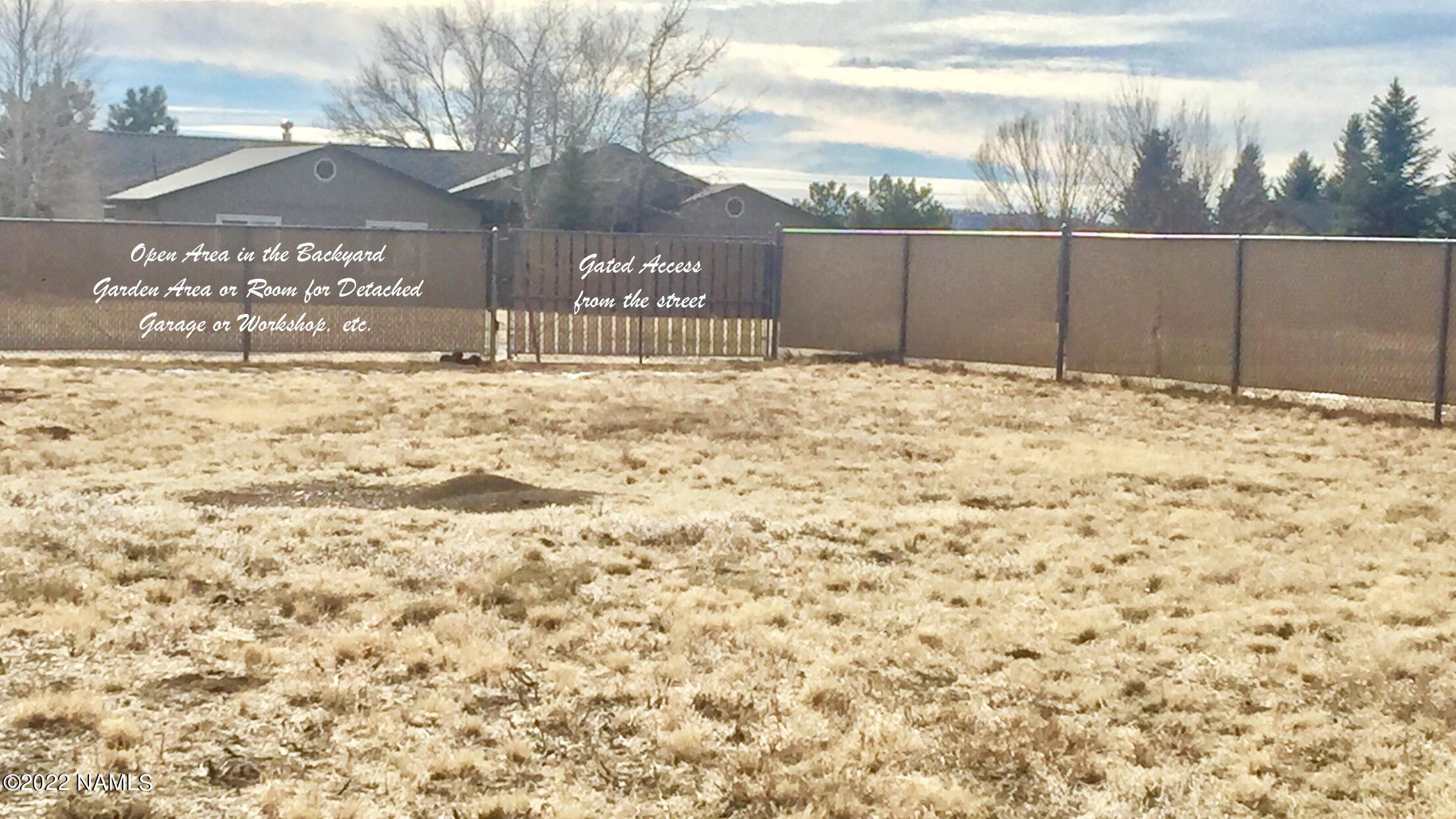 9612 Pioneer Valley Road Flagstaff, AZ 86004 - Photo 51 of 64 Backyard open area_Gate