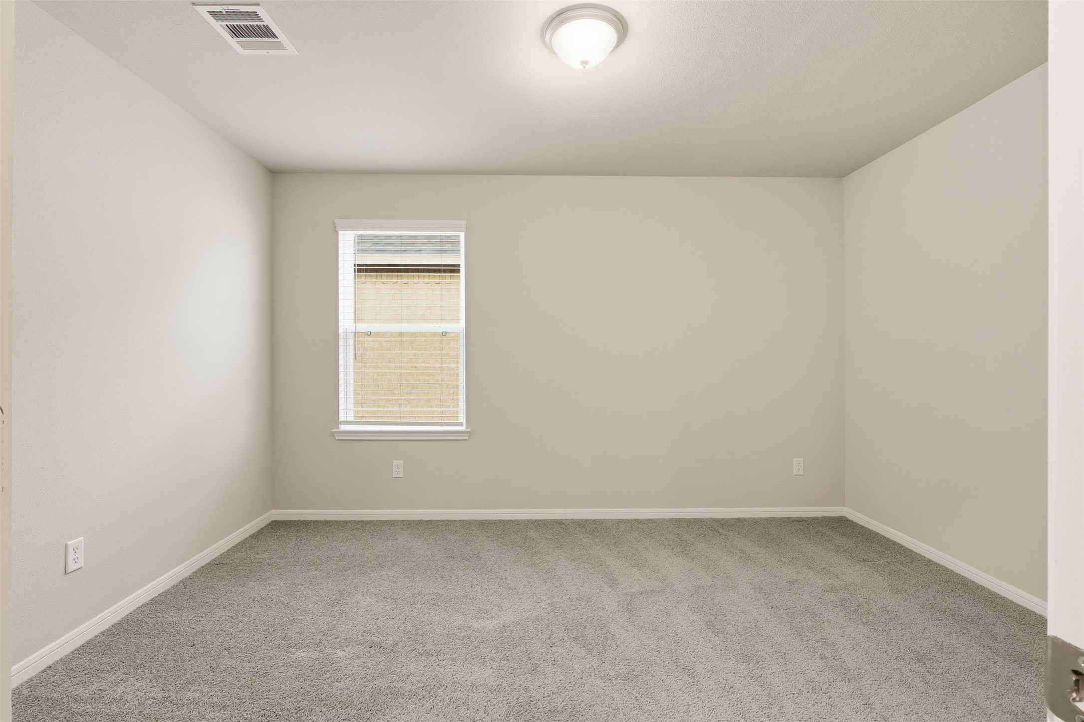 3227 Falling Brk Drive Baytown, TX 77521 - Photo 22 of 28 an empty room with a window