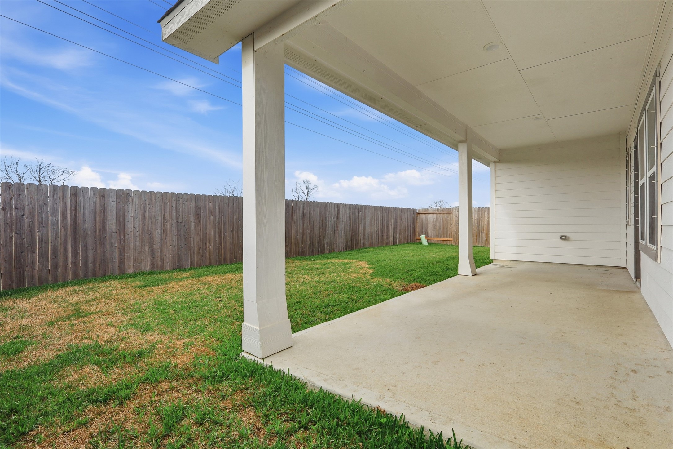 3227 Falling Brk Drive Baytown, TX 77521 - Photo 26 of 28 a view of a backyard with wooden fence