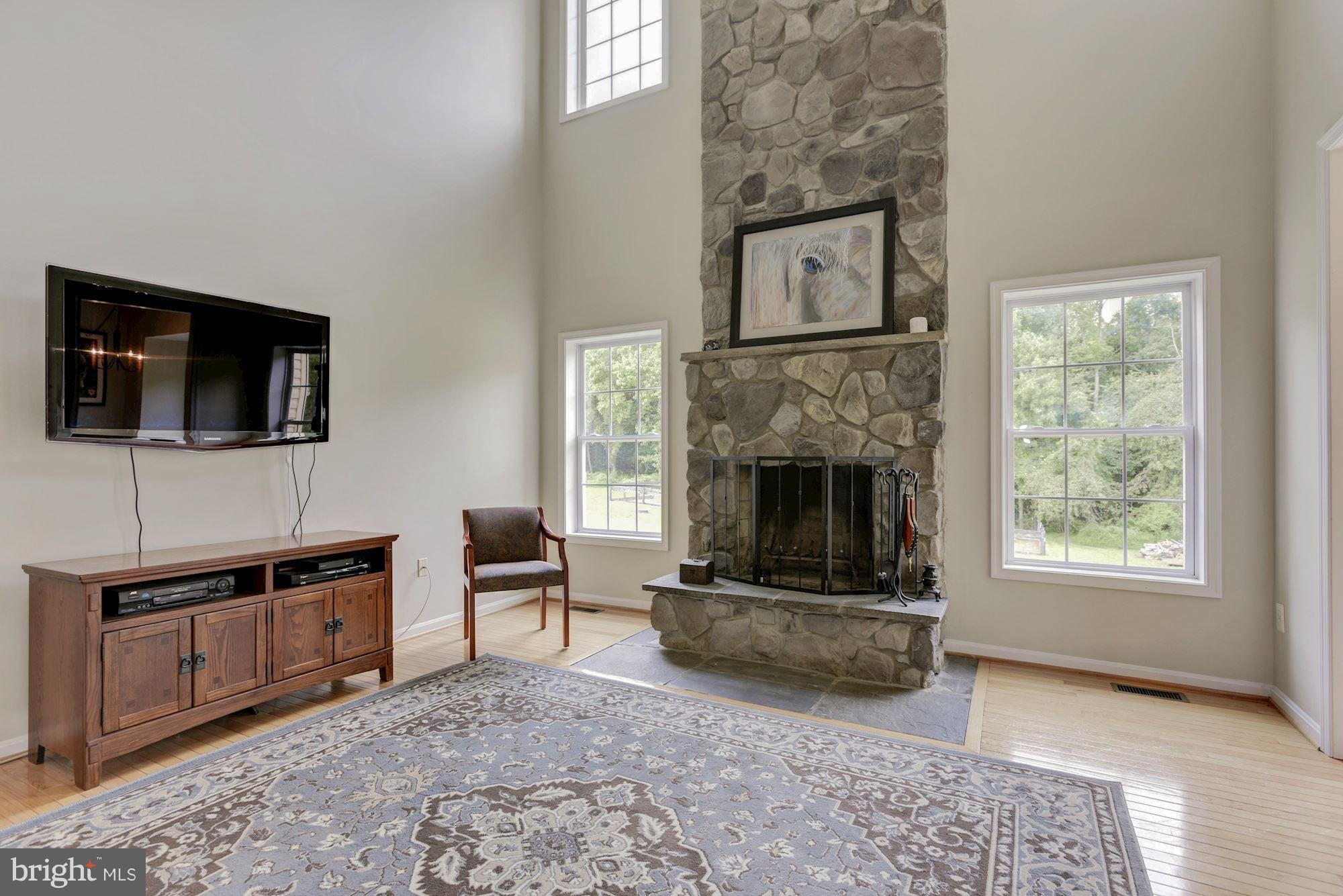 43661 Spinks Ferry Road Leesburg, VA 20176 - Photo 6 of 30 2-Story Family Room with Stone Fireplace