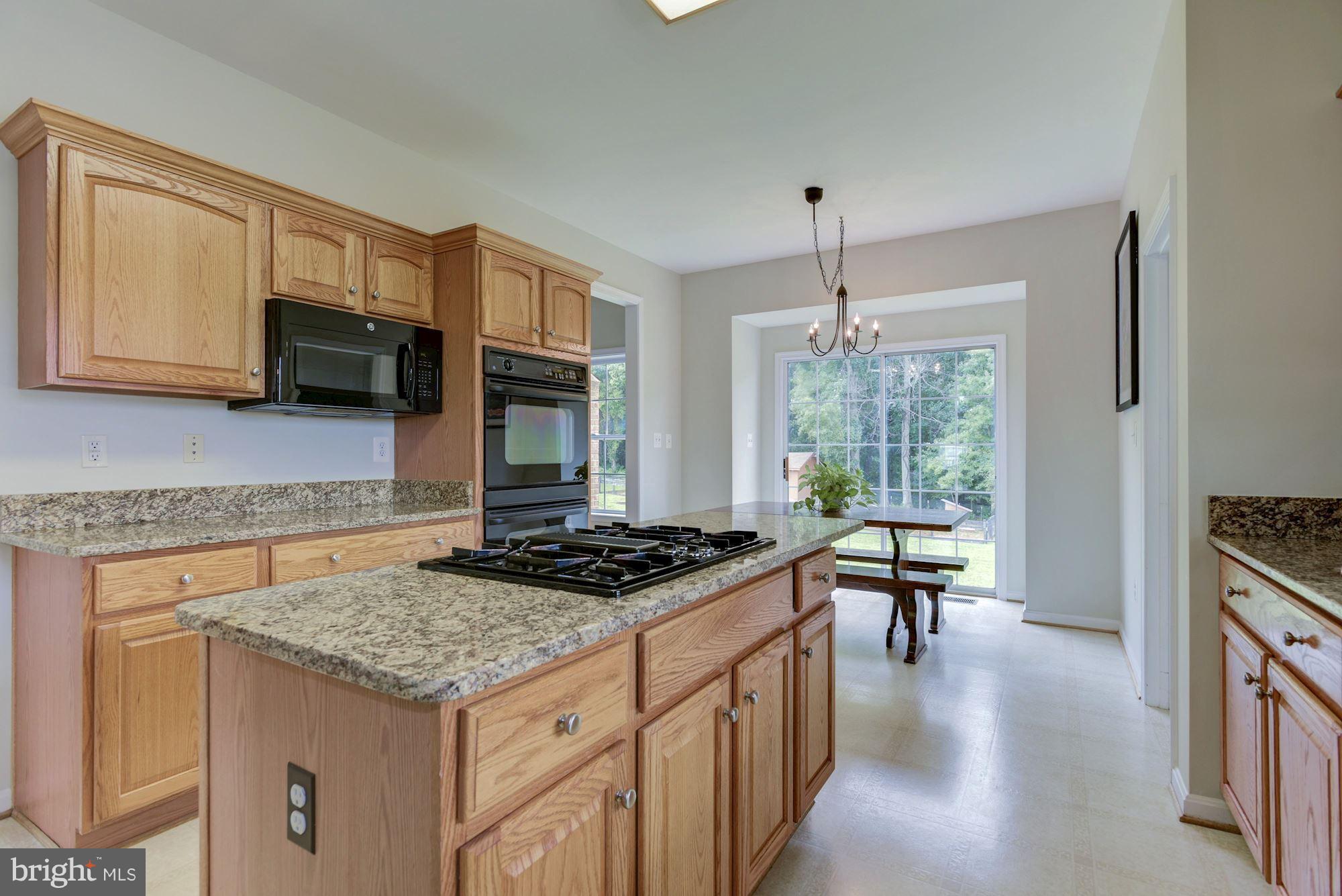 43661 Spinks Ferry Road Leesburg, VA 20176 - Photo 9 of 30 Kitchen with Sunny Eat-in Area