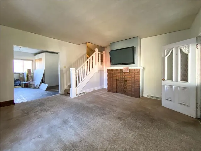 a view of an empty room and window