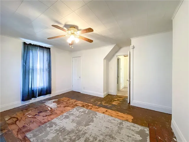 a view of an empty room and window