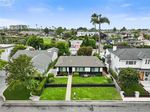 a aerial view of a town with big yard and plants
