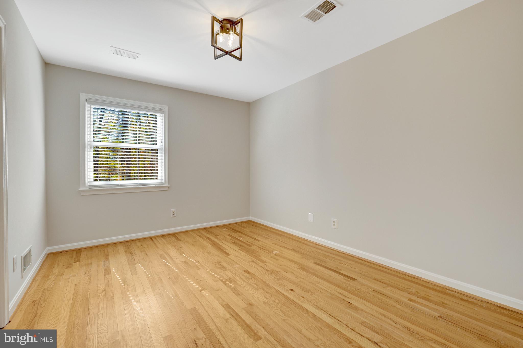 11809 State Rte 4707 Reston, VA 20191 - Photo 42 of 70 Bedroom #2 overlooks the side of the home.
