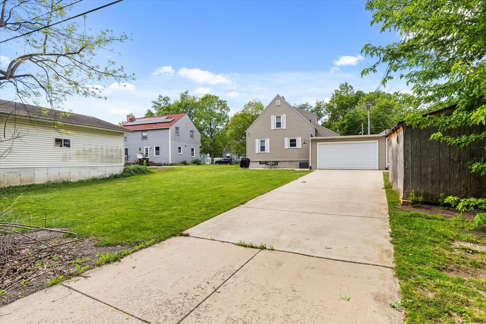 742 Chambers Street Ottawa, IL 61350 - Photo 39 of 39 a front view of a house with a yard and garage