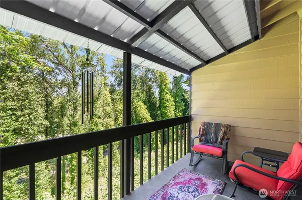 a view of a porch with furniture