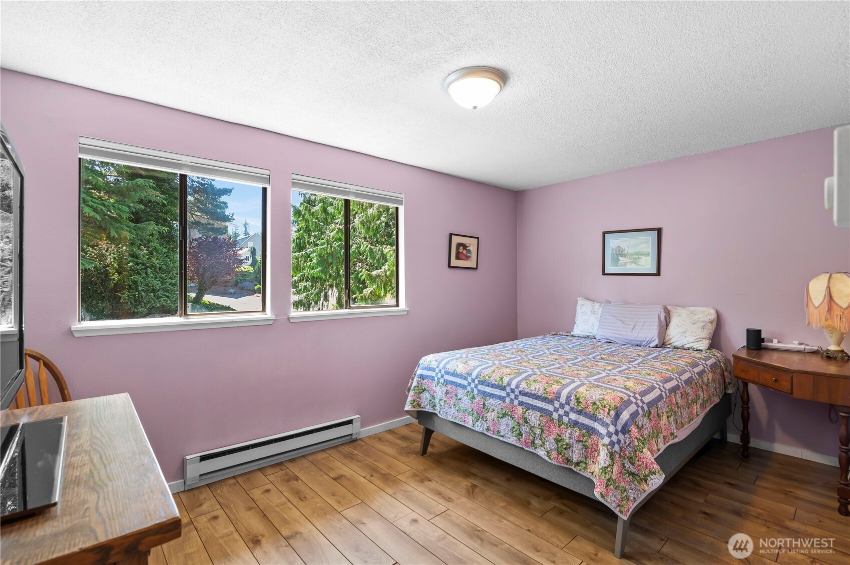1211 North 8th Street, Unit 4 Mount Vernon, WA 98273 - Photo 8 of 12 a bedroom with a bed and a window